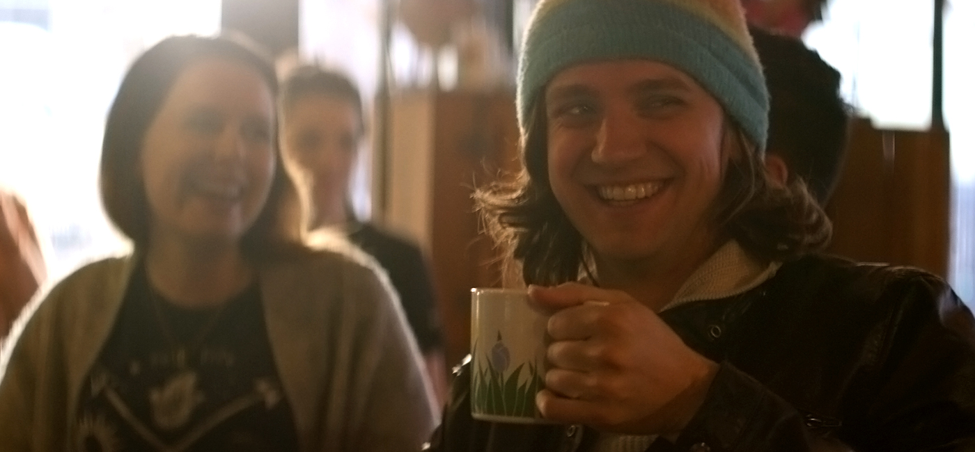 Kyle enjoying a cup of coffee